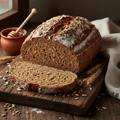 Organic seeded rye and wheat bread loaf topped with sunflower, pumpkin, sesame, poppy and linseeds